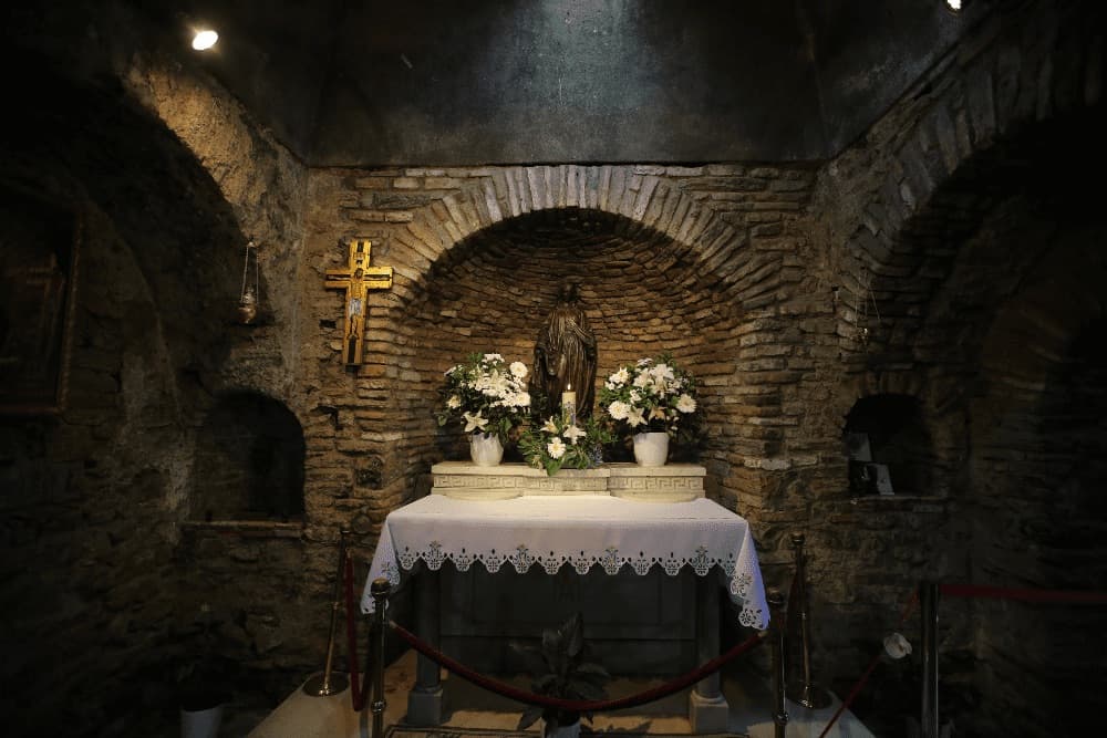 Candle-lit altar inside the House of the Virgin Mary chapel on Mount Koressos