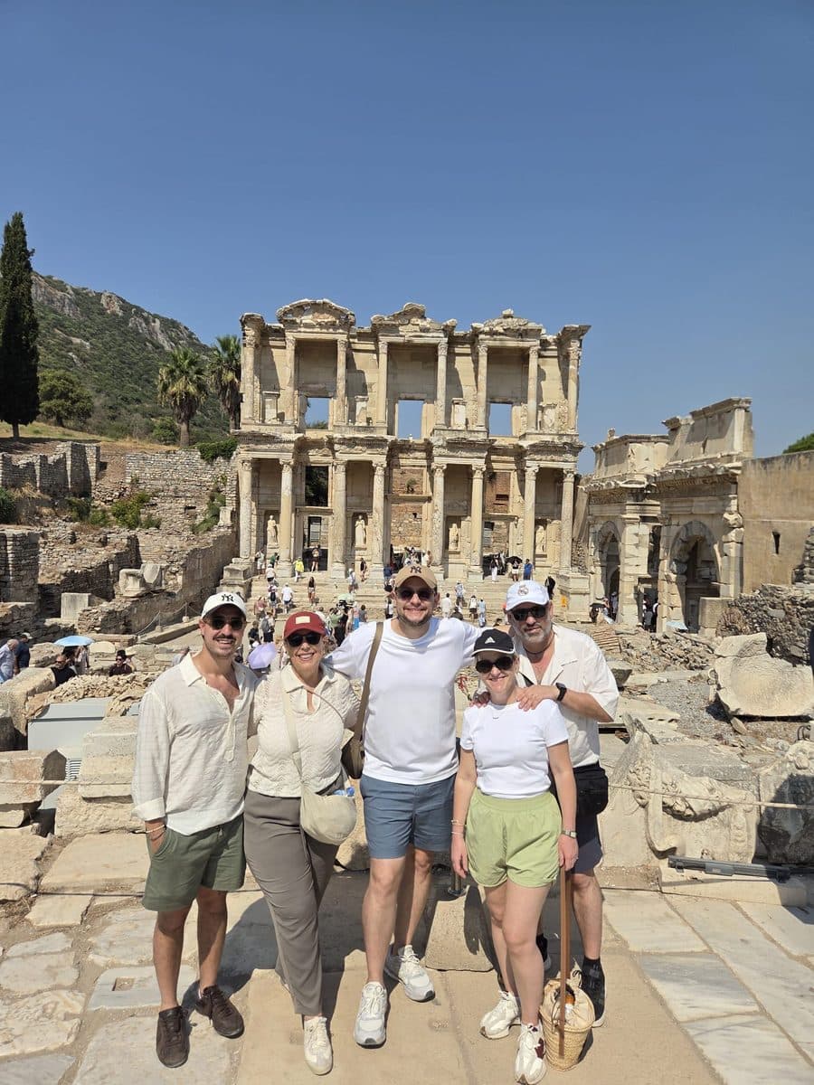 Five Celebrity Xcel guests in front of the Library of Celsus at Ephesus on a private tour from Kuşadası, 13 August 2026