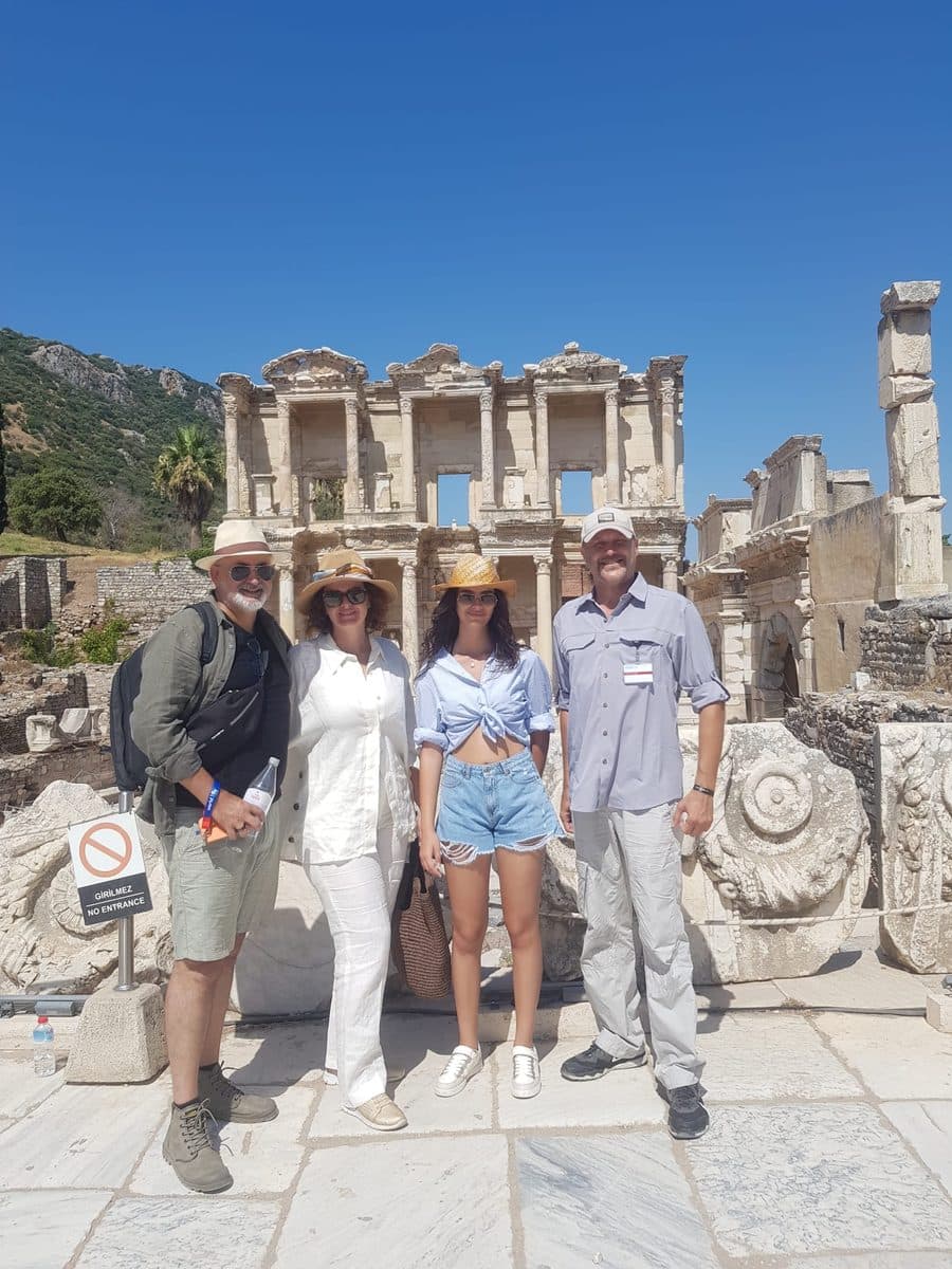 A private Ephesus tour group from Celebrity Infinity with licensed guide Serdar Atalan in front of the Library of Celsus, 28 July 2026