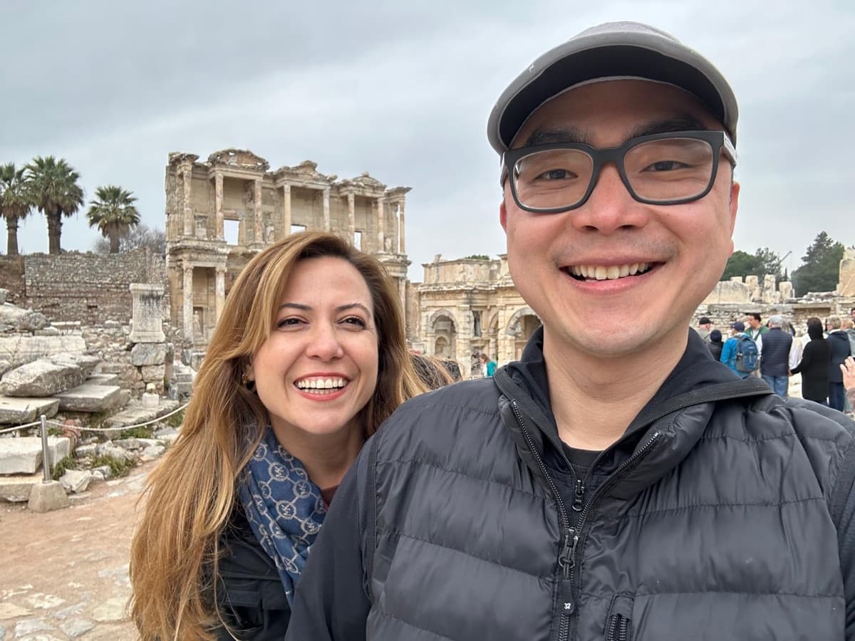 Tours of Ephesus guide Ceyda Baydur with her guest in front of the Library of Celsus and the Gate of Augustus, Ephesus