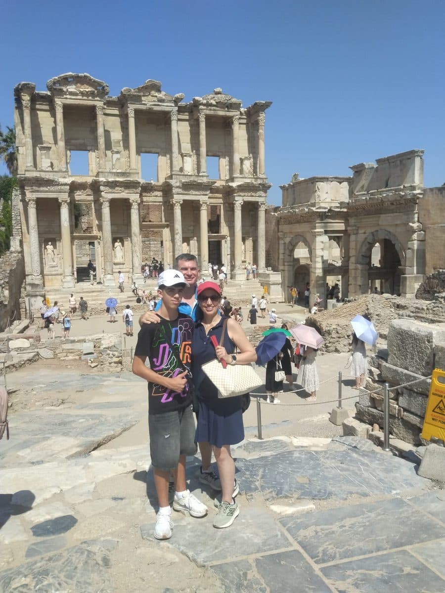 Guests from the MSC Divina on the marble pavement below the full height of the Library of Celsus, private Ephesus tour, 27 July 2026