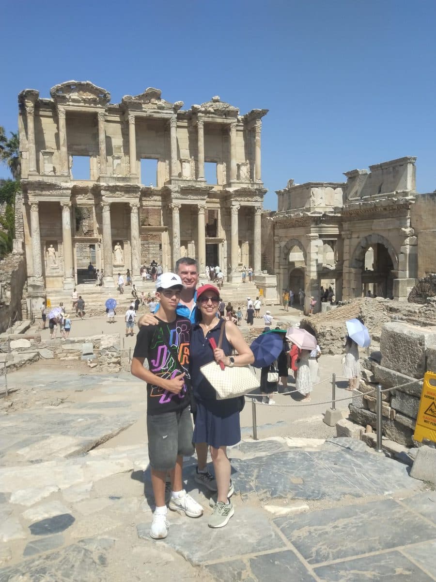 Family of three from the MSC Divina at the Library of Celsus, the Gate of Mazaeus and Mithridates to the right, private Ephesus tour, 27 July 2026