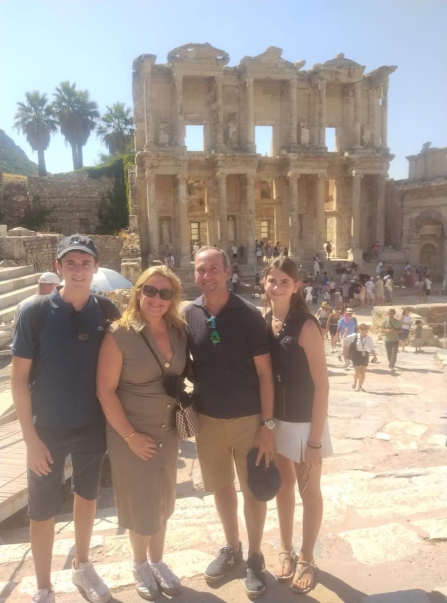 A family of four from Norwegian Viva in front of the Library of Celsus at Ephesus, on a private tour from Kuşadası cruise port, 1 August 2026