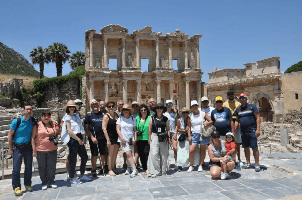 Large private group posing in front of the Library of Celsus at Ephesus